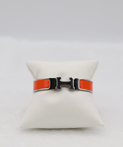 Vibrant Orange Enamel “H” Bracelet – Silver Tone