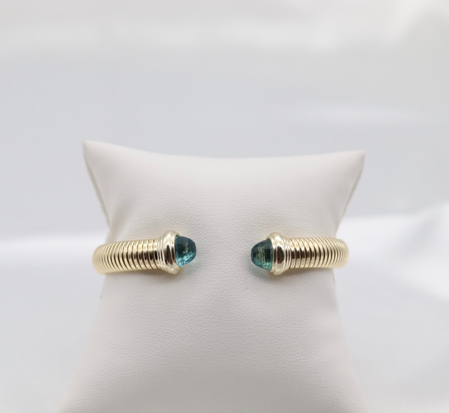 Gold Tubogas Cuff Bracelet With Light Blue Crystal Ends