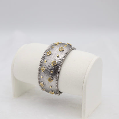 Wide Textured Silver Cuff Bracelet with Gold Floral Accents