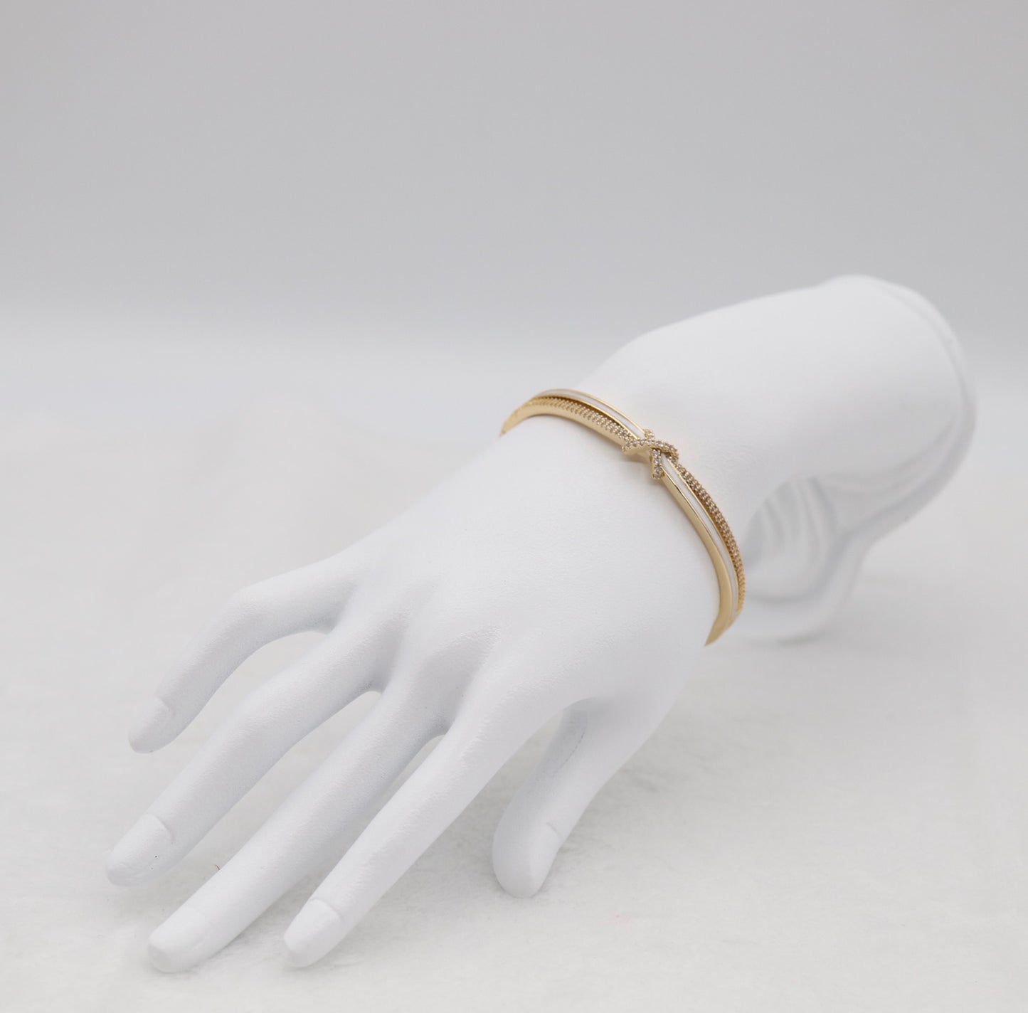 Gold-Tone Cuff Bracelet with Crystal Pavé Bow