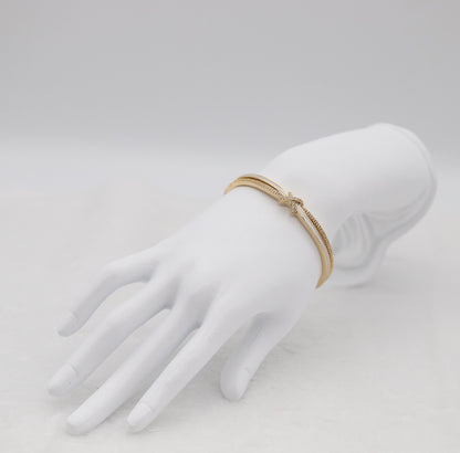 Gold-Tone Cuff Bracelet with Crystal Pavé Bow