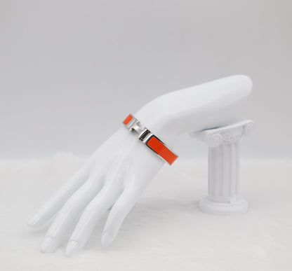 Vibrant Orange Enamel “H” Bracelet – Silver Tone
