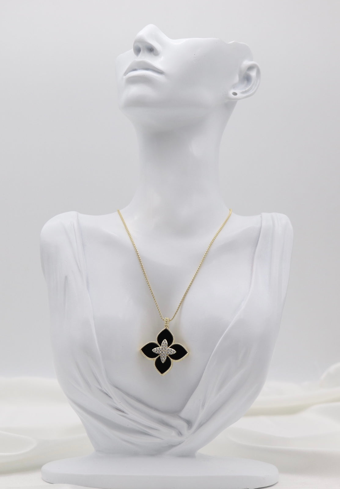 Black Clover Luxe Pendant Necklace – Gold Tone with Crystal Center