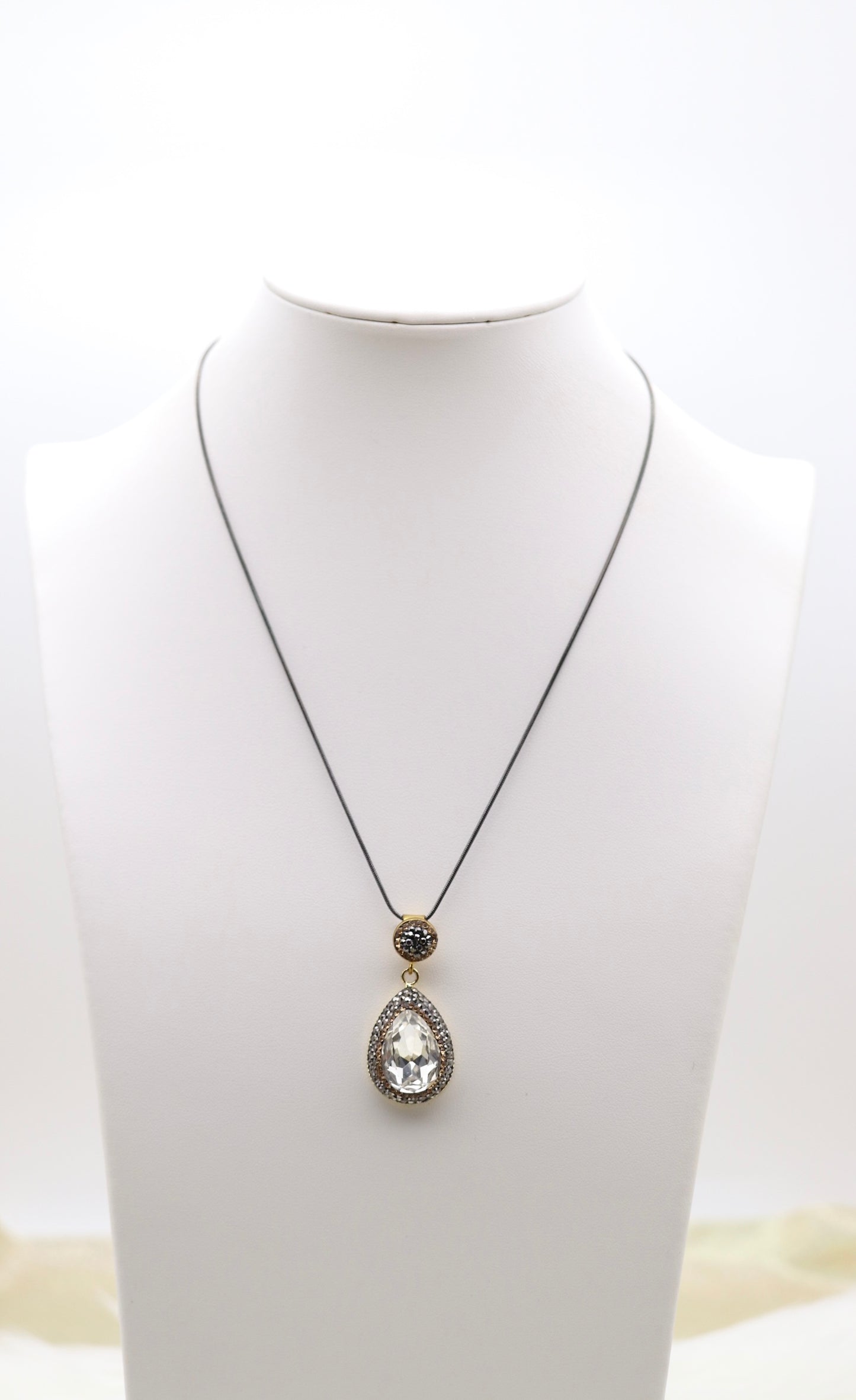 Matching Necklace and Earrings With Pear Shaped Clear Faceted CZ Stones With Gold Trim