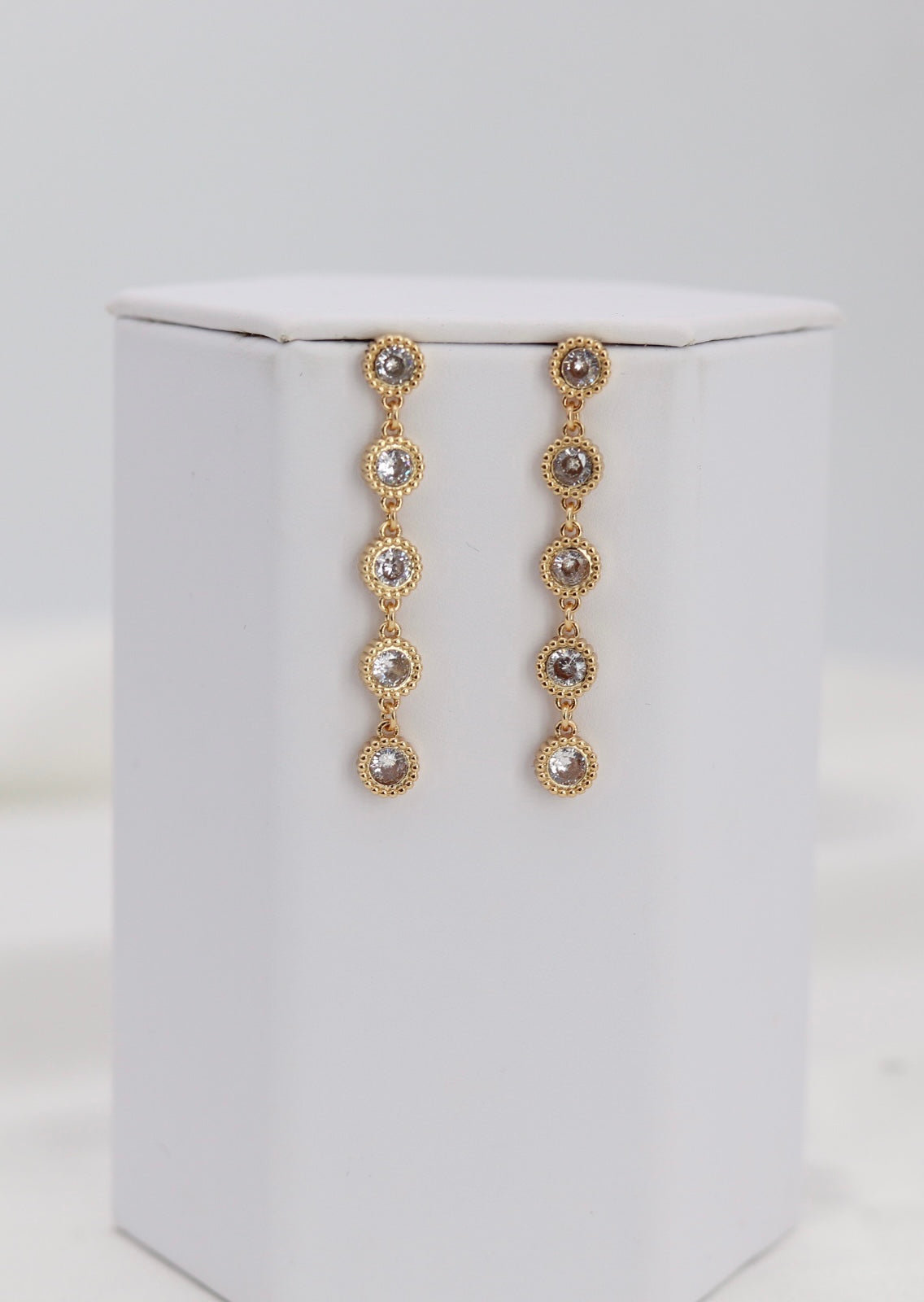 Golden Halo Crystal Drop Earrings – Multi-Stone Dangle Design