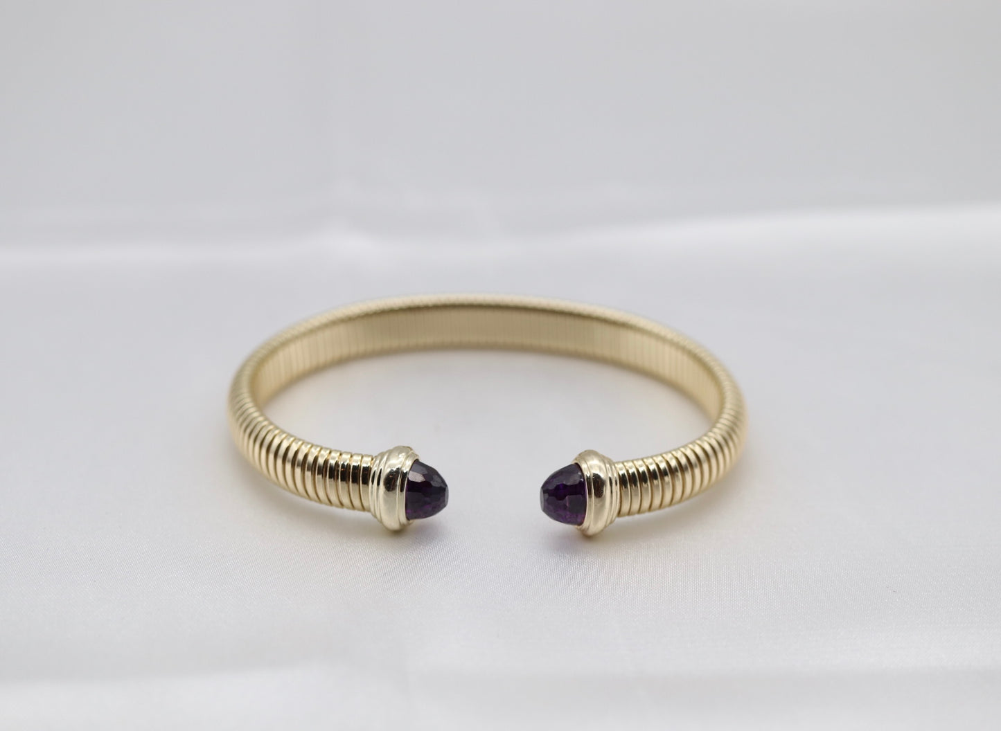 Gold Tubogas Cuff Bracelet With Violet Crystal Ends