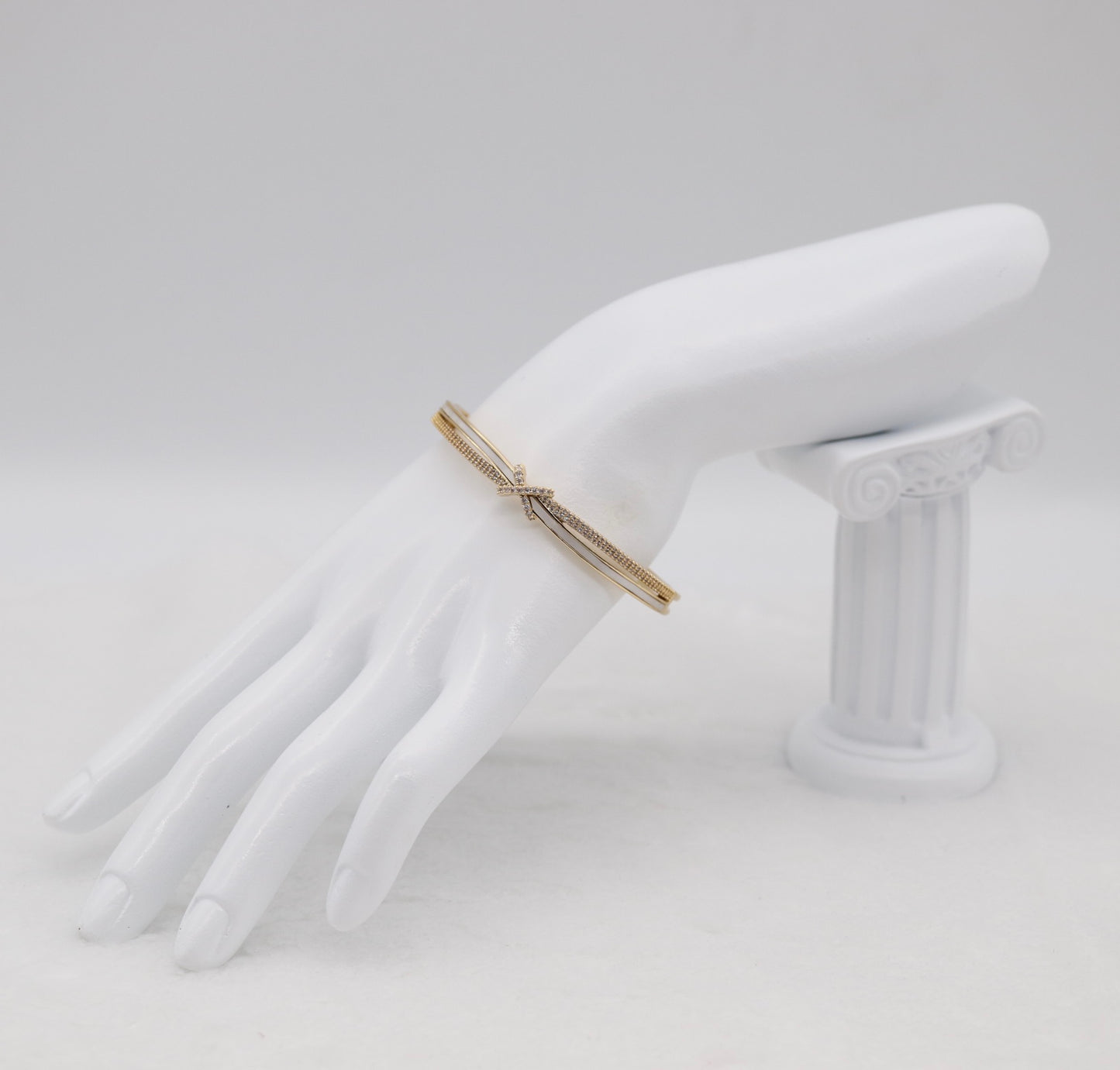 Gold-Tone Cuff Bracelet with Crystal Pavé Bow