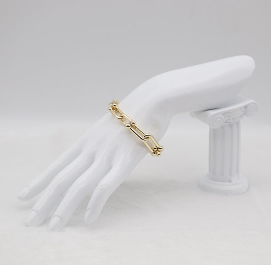 Bold Gold Link Bracelet with Ball Accents