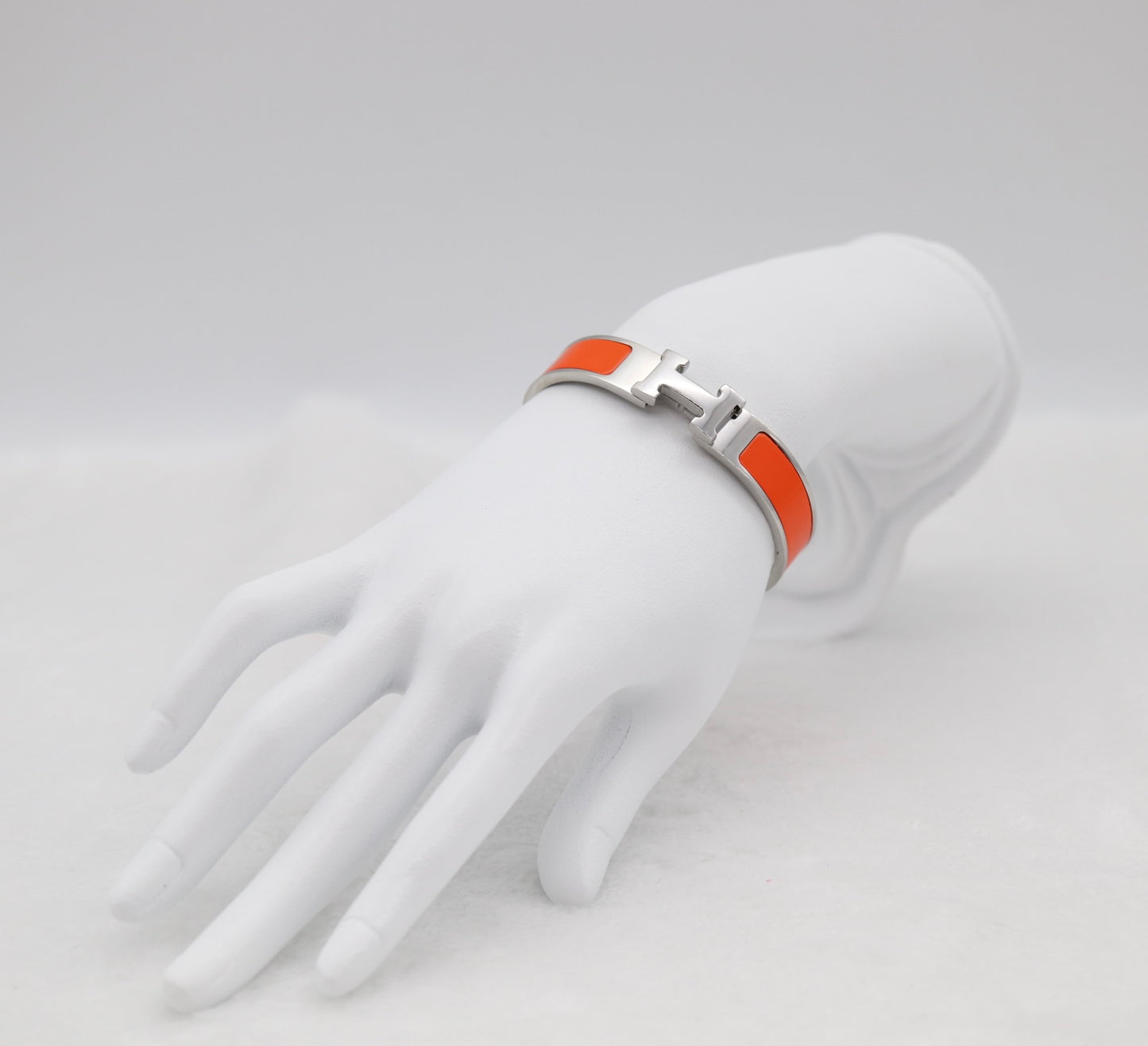 Vibrant Orange Enamel “H” Bracelet – Silver Tone