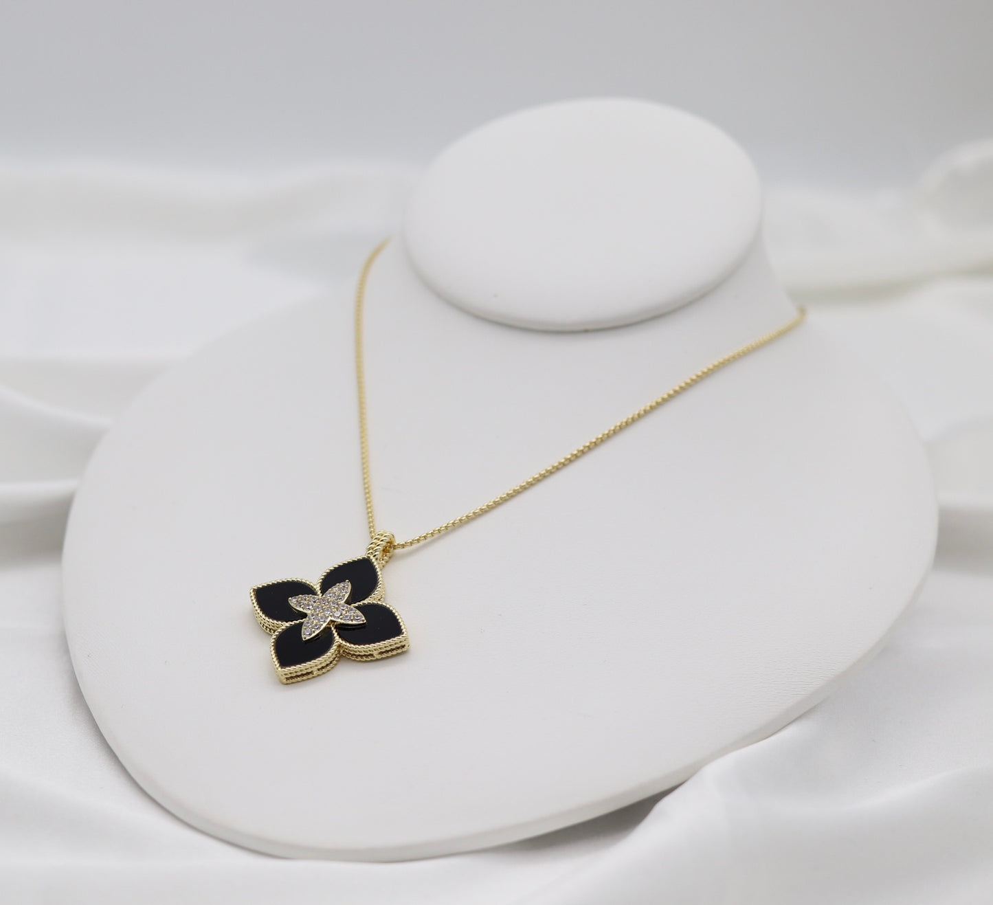 Black Clover Luxe Pendant Necklace – Gold Tone with Crystal Center