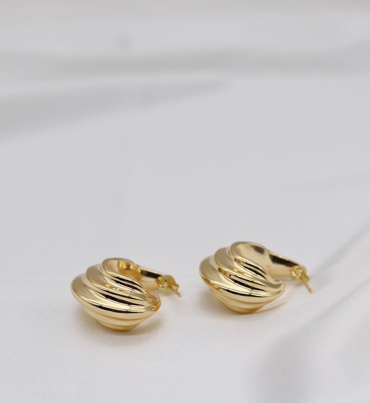 Golden Wave Huggie Hoops