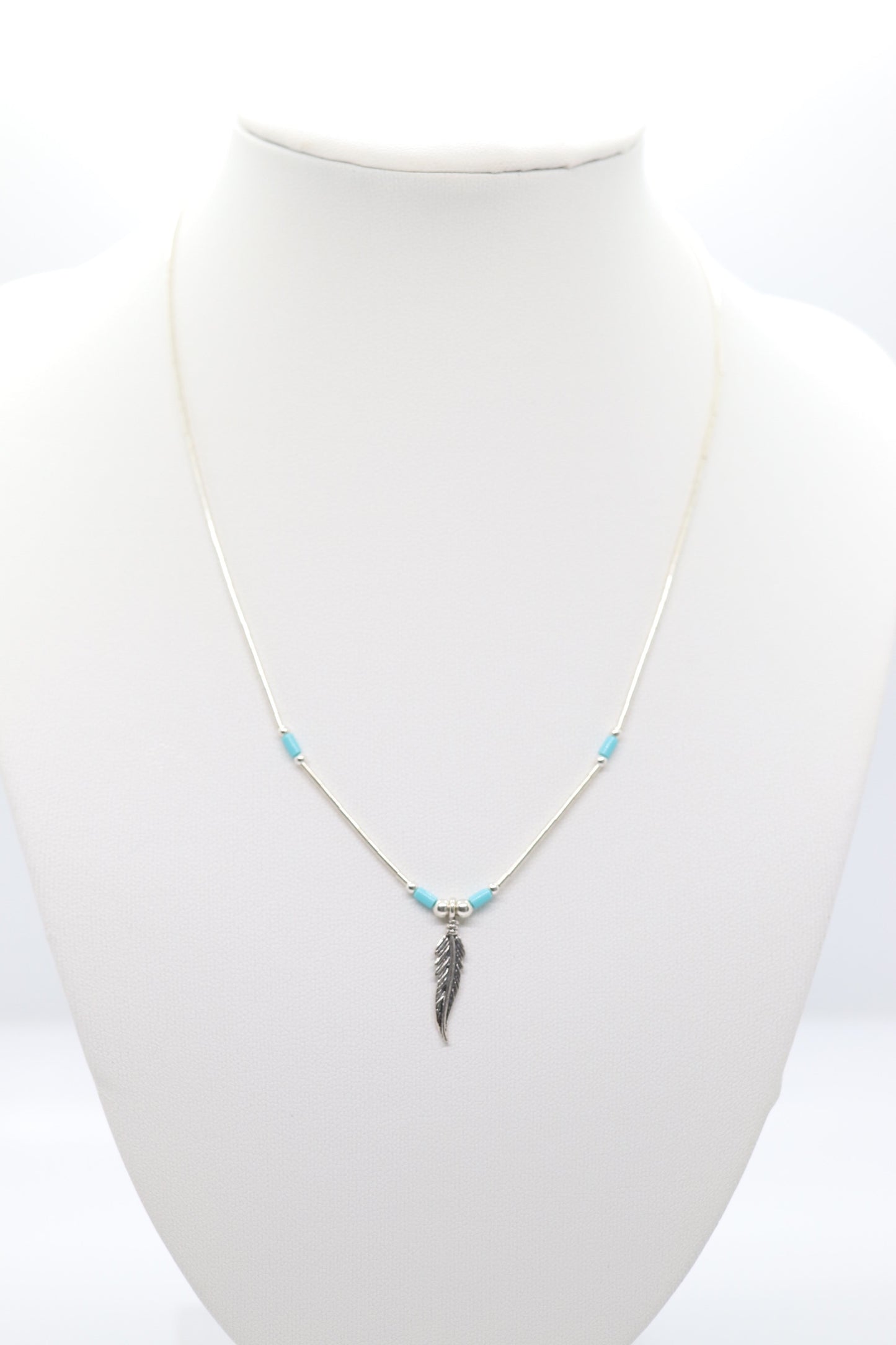 Turquoise Beaded Silver Necklace With Feather Pendant