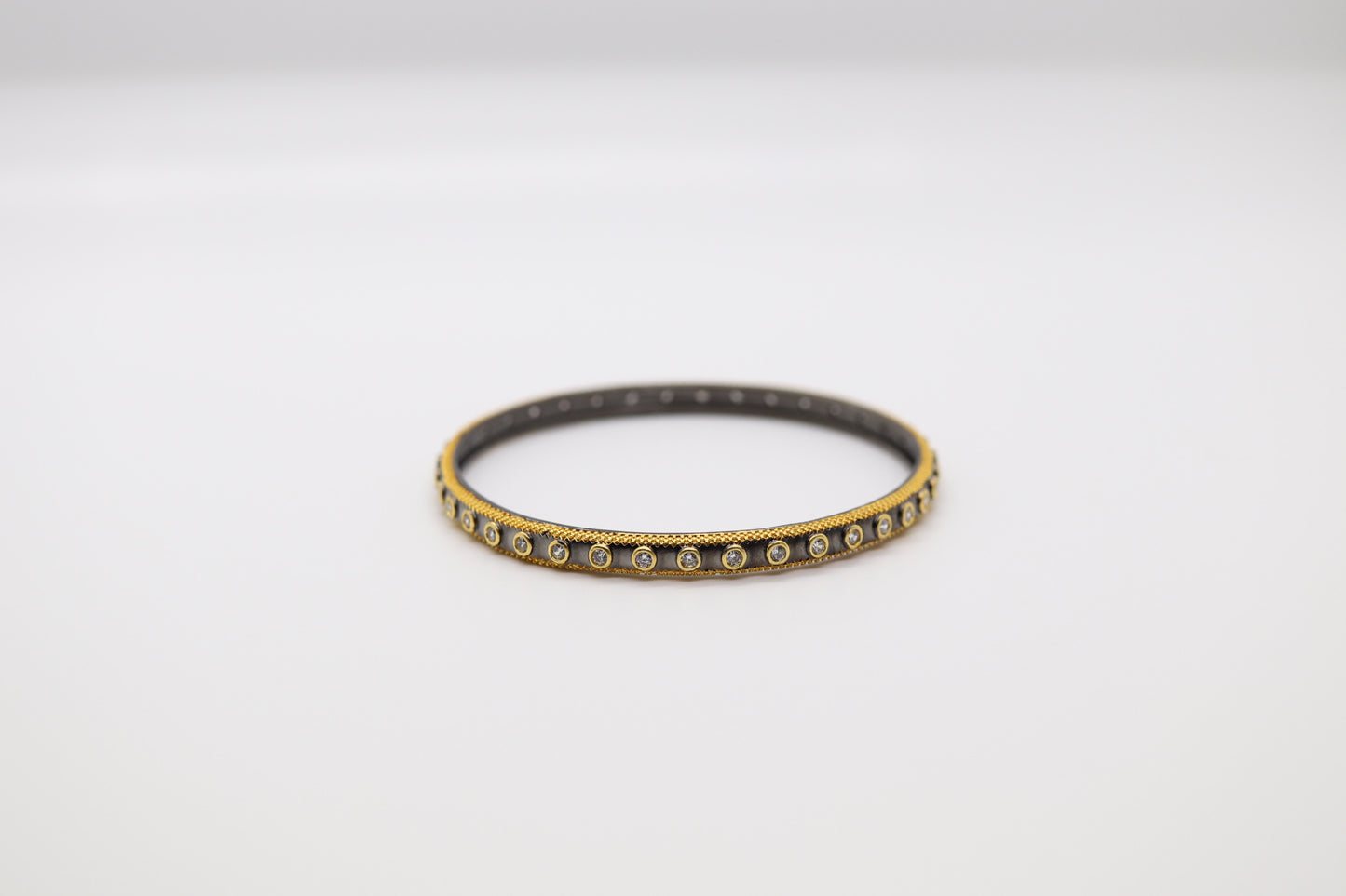 Black and Gold Bangle with CZ Stations