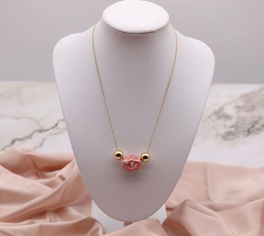 Gold Necklace with Horizontal Pink Tie Dye Egg Shape Pendant