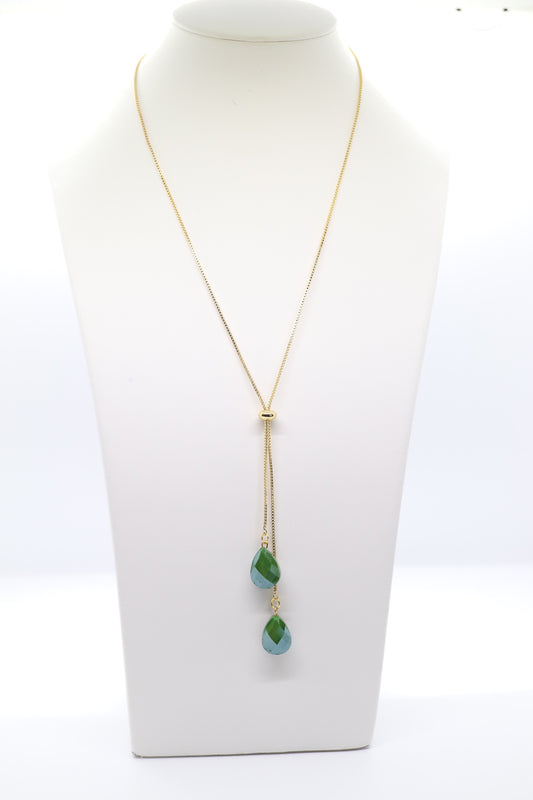 Gold Necklace With Dangling Emerald Teardrops Stones