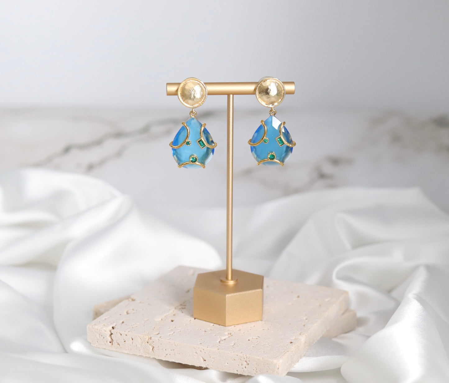 Gold and Sky Blue Dangling Earrings with Emerald Green Tanzanite Stones Embedded